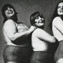 plus-size fashion history three women in tights